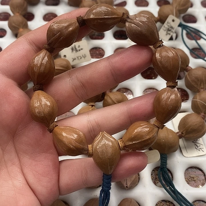 橄榄核吊坠1624三面佛梅林铁核