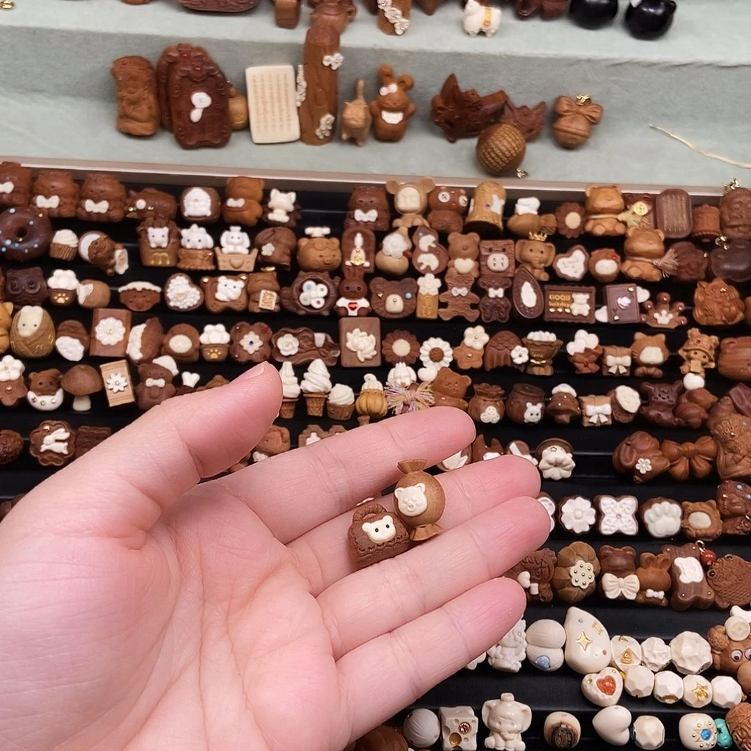 谷***妮檀香木无事牌福利价