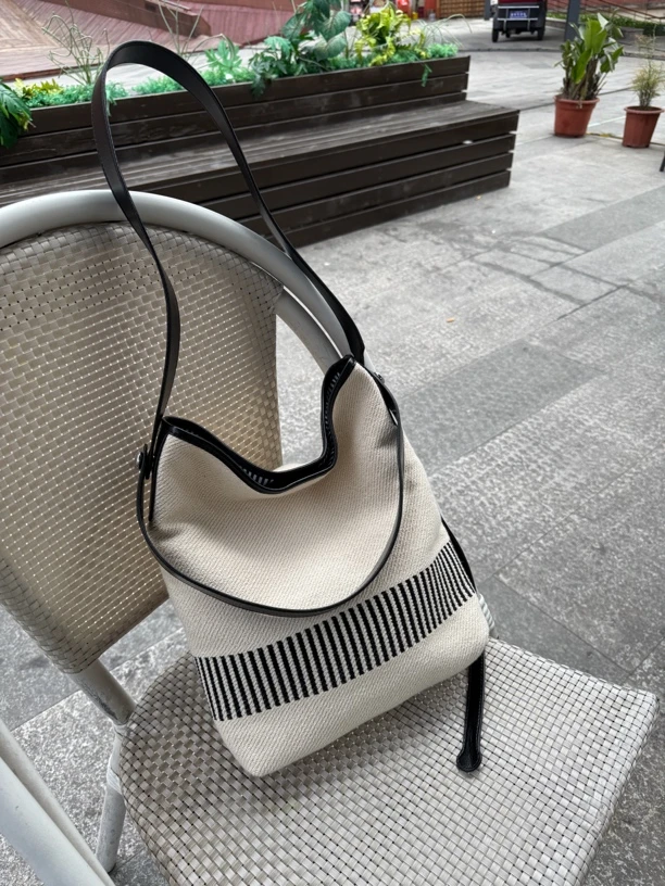 棉麻帆布配头层牛皮托特包新款水桶包大容量单肩手提斜挎包65895