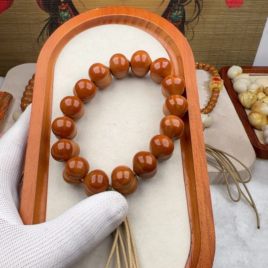 甜****手串猴头核桃大屁桃