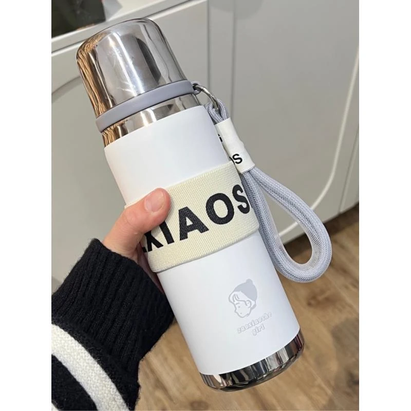 大美陶瓷丸子头女孩保温杯680ml