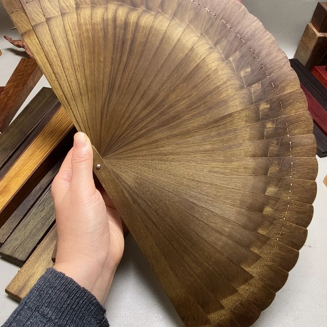 楠木兜****妈金丝楠木21.5折扇