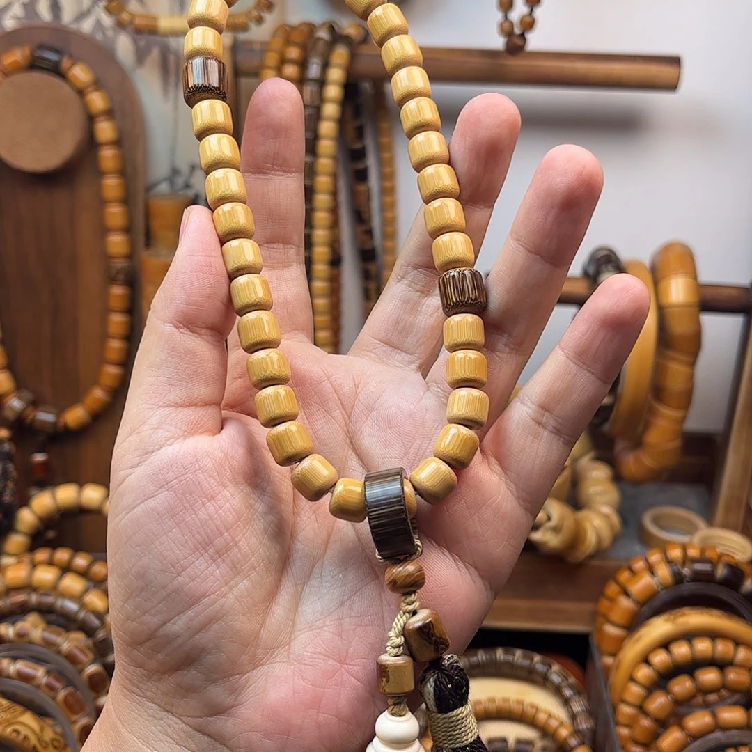 尹***约拂云梢手作。 手持