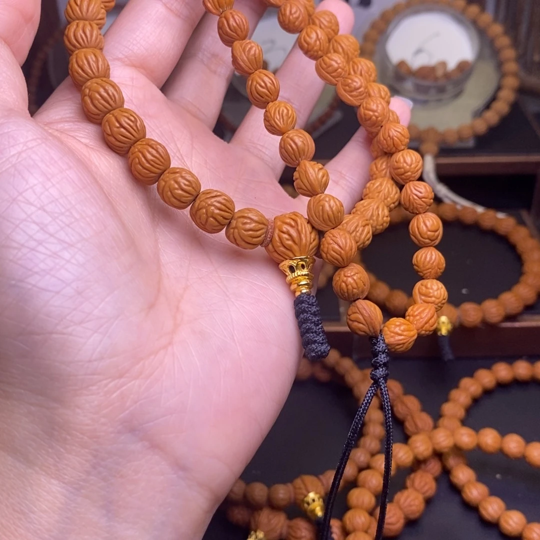 用***4手串桃核龙文桃核