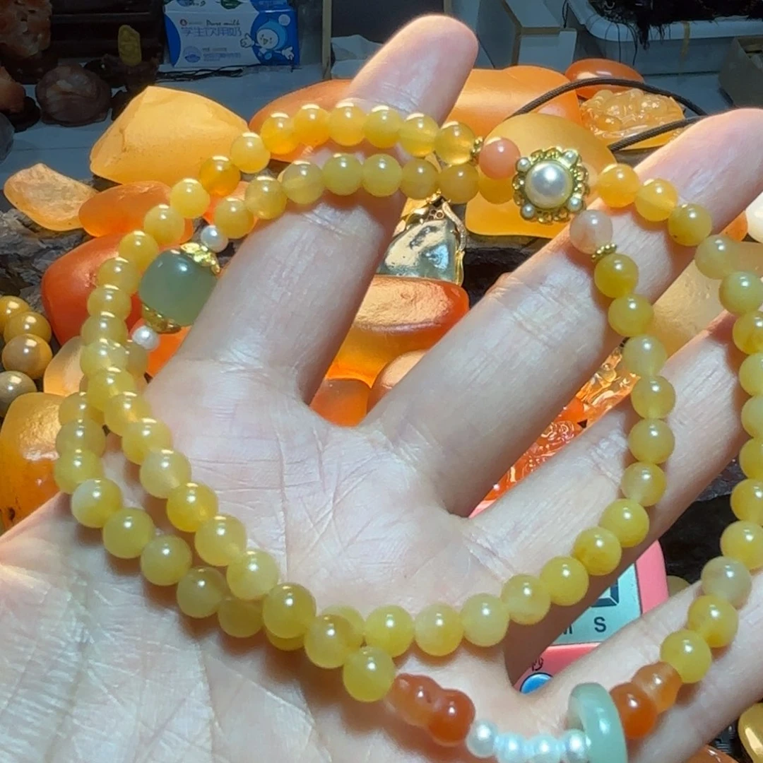 石英岩玉手串未镶嵌春**龙