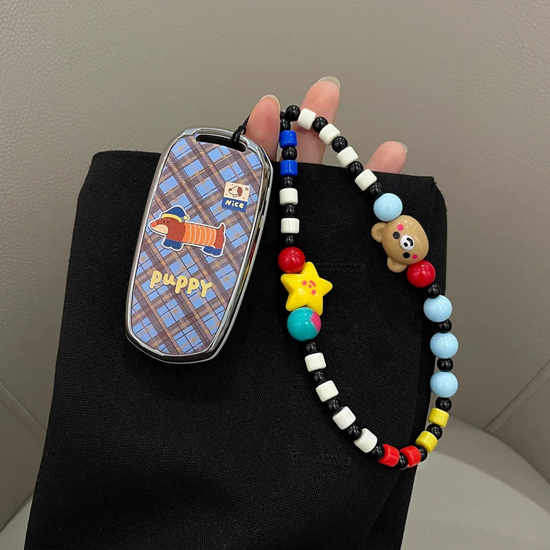 适用吉利熊猫mini钥匙套迷你骑士卡丁博越s1远景x3壳车扣女耐力熊