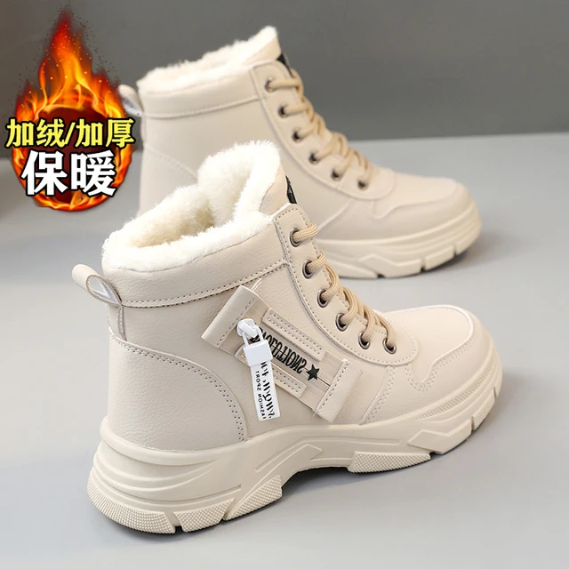 哈尔滨真皮雪地靴女防水防滑冬季加绒加厚东北大棉鞋短筒马丁靴子