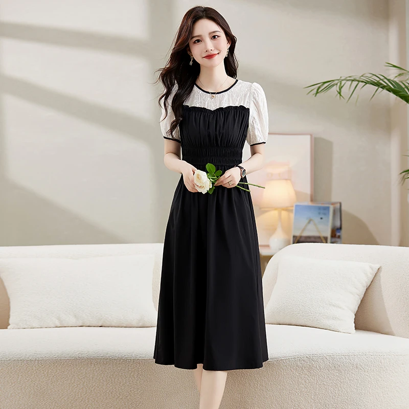 连衣裙女2025夏季新款拼接泡泡袖气质优雅简约大气修身显瘦中长裙