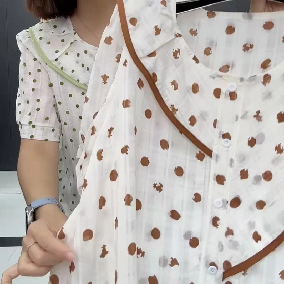 影011时尚洋气宽松透气波点气质荷叶边半袖衫