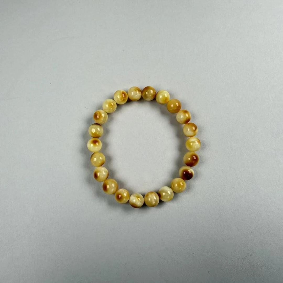 蜜蜡沁色蜡圆珠手串  B1089