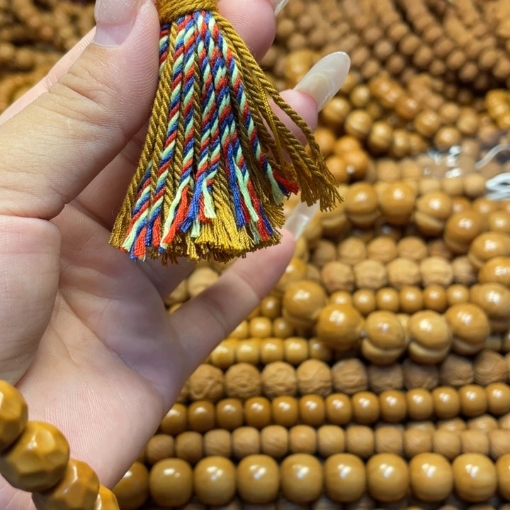 小***。核桃手捻流苏配饰