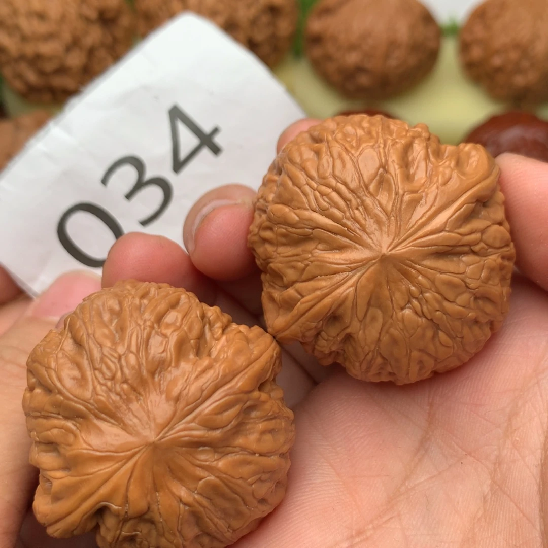 文玩核桃把件边肚同尺40铁锤