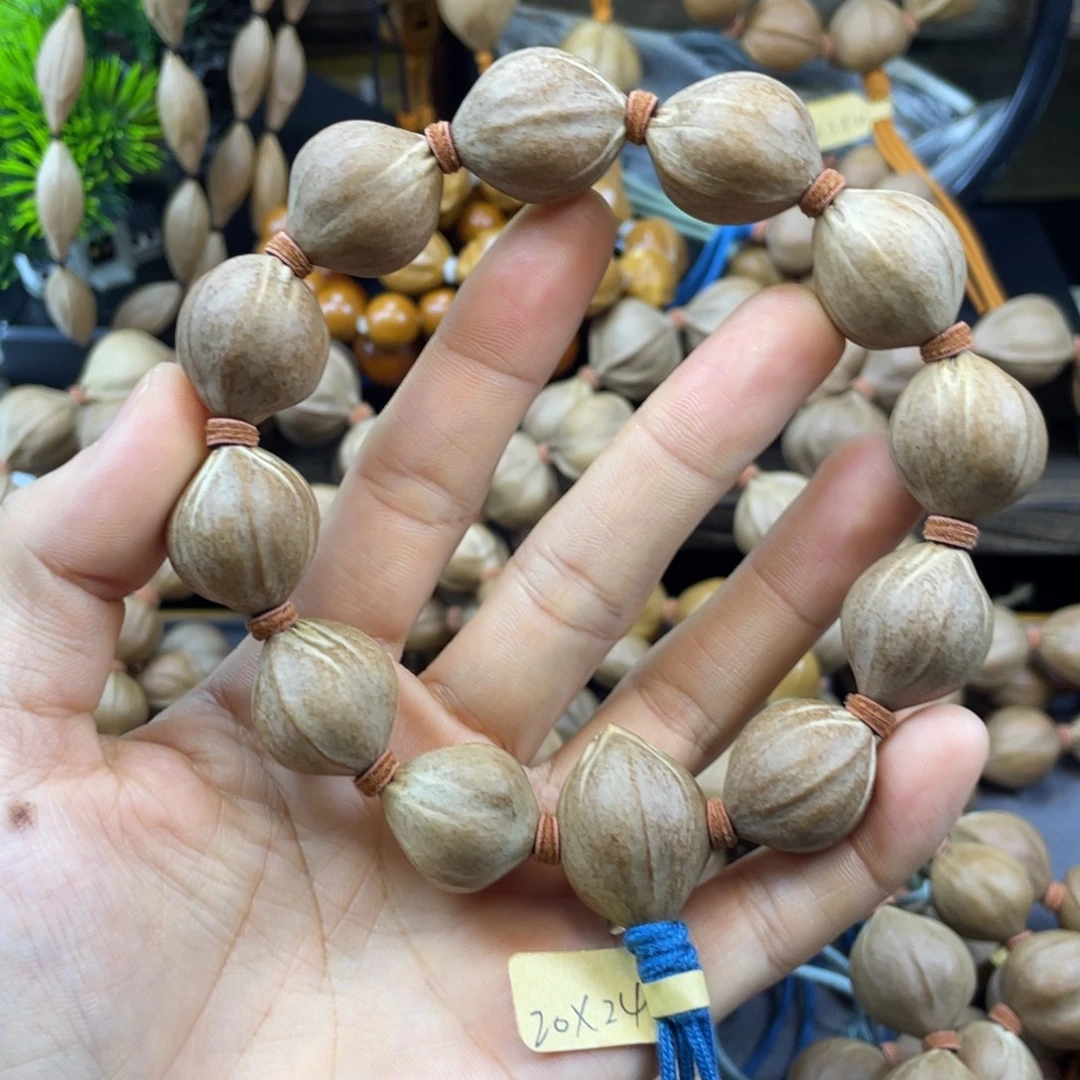 那***月吊坠橄榄核2024红核