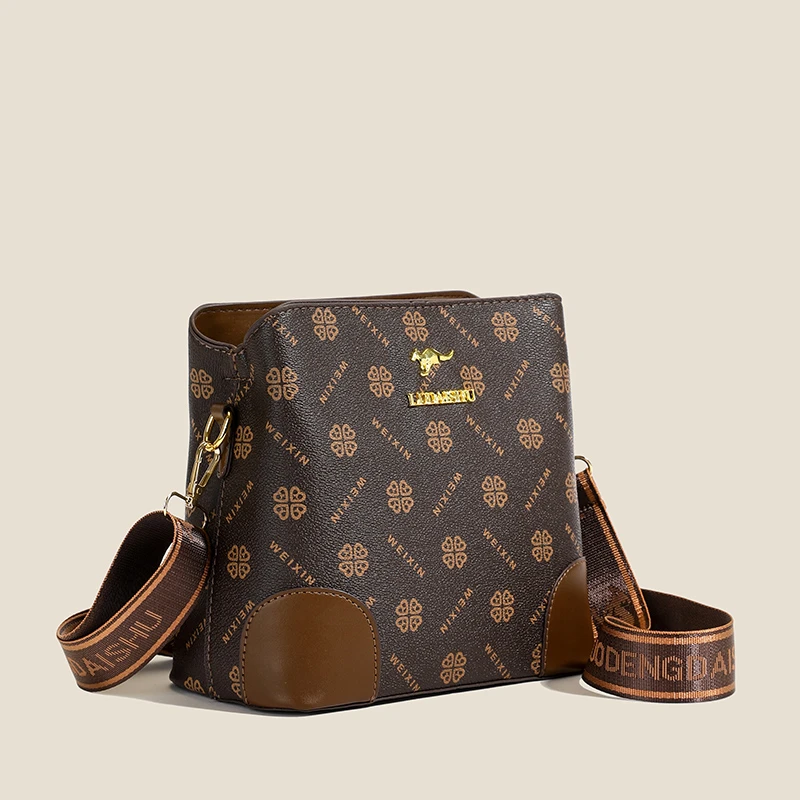 2024新款时尚洋气百搭单肩女士斜挎包包水桶包小花