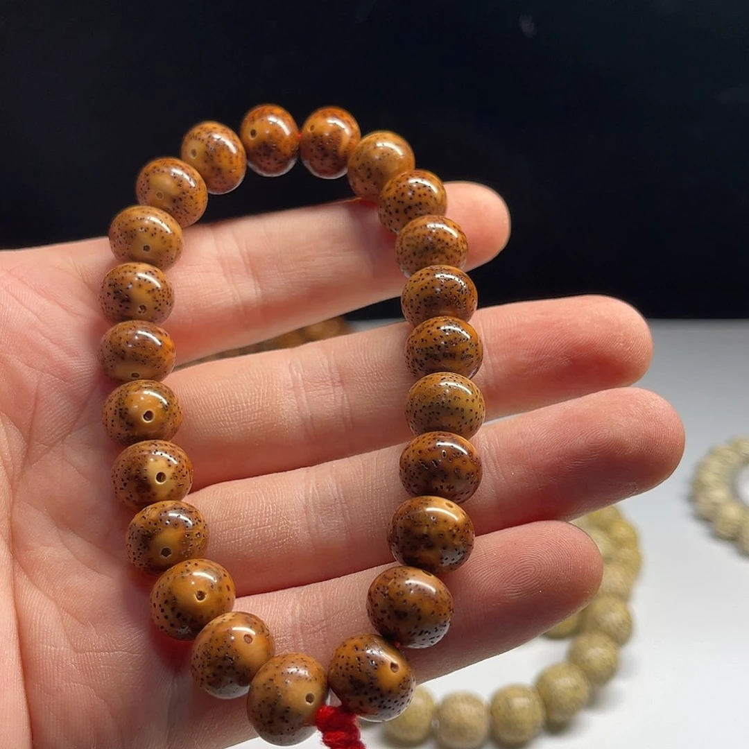 星月菩提吊坠12/10大年份陈华料手持