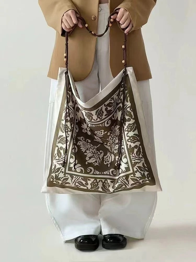 欧美复古曼波 印花波西米亚风丝巾包2025新款包单肩大容量包双面