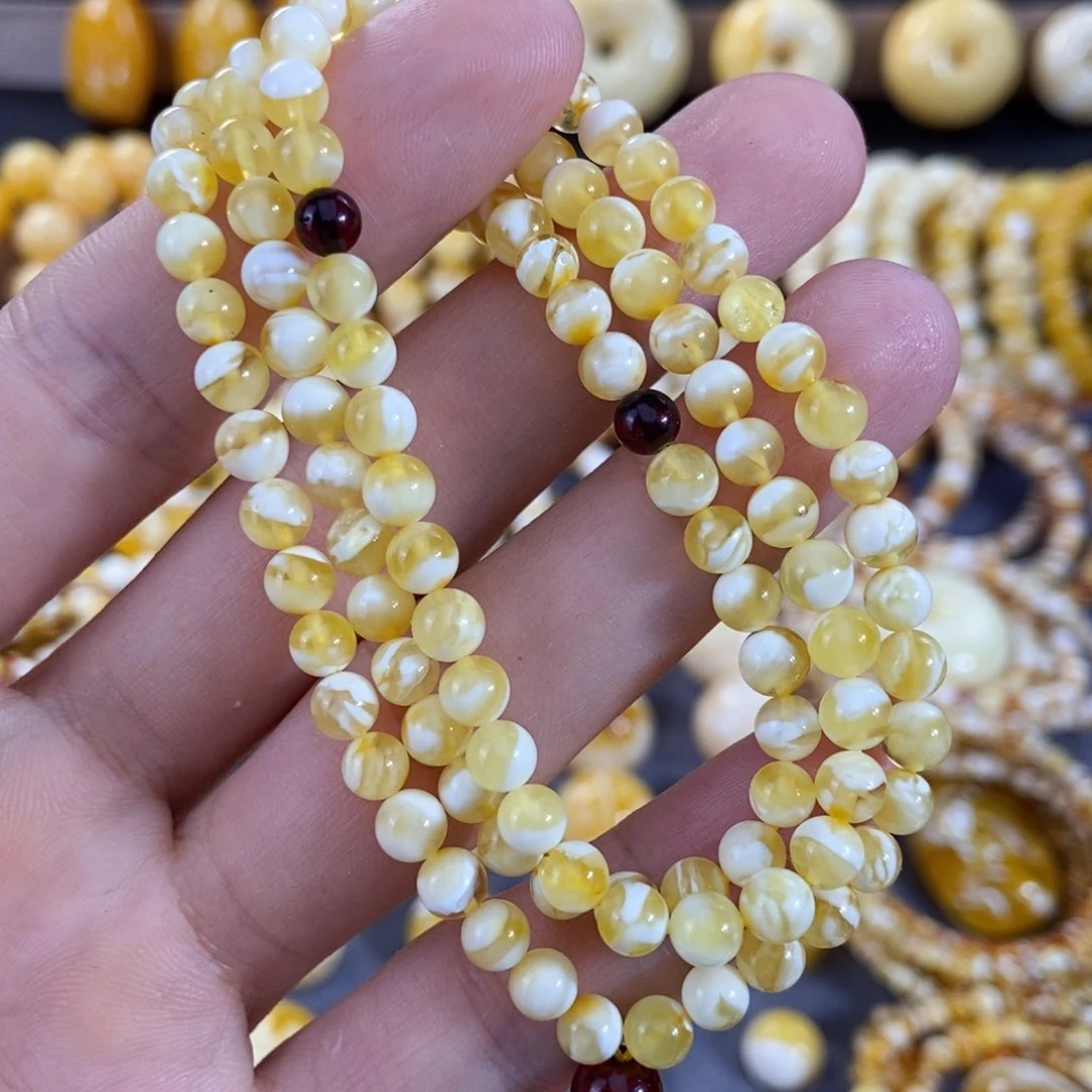 琥珀手链未镶嵌是***呀5mm左右金白