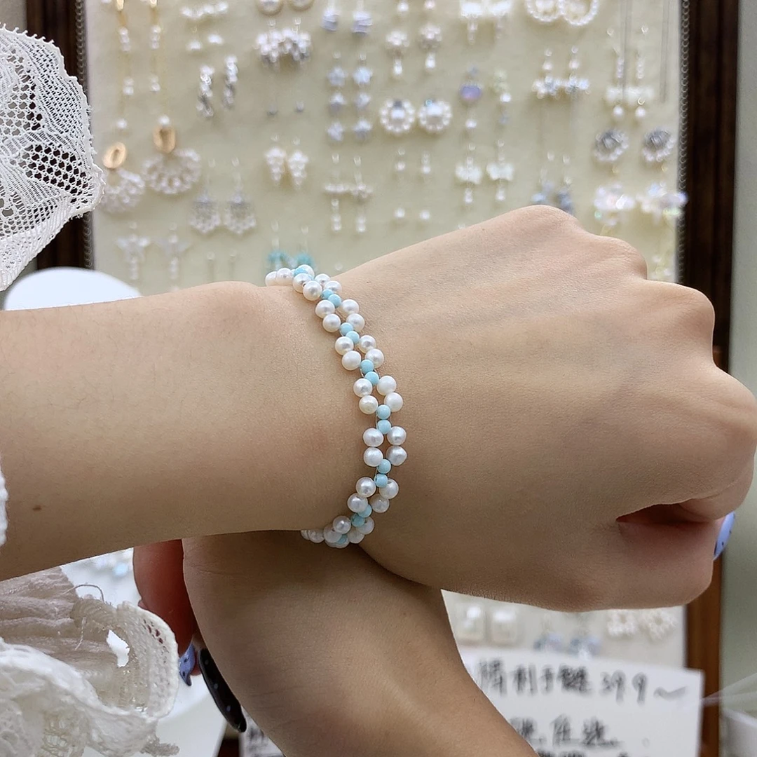 淡水珍珠银S925镶嵌耳饰