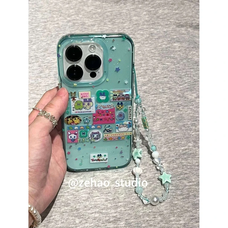 半透绿拓麻歌子适用苹果16pro手机壳iphone15创意14卡通13全包女