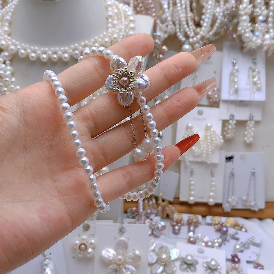 银S925镶嵌耳饰淡水珍珠圆***肉