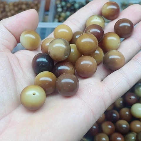 白玉菩提吊坠16.6微瑕焦糖圆20颗
