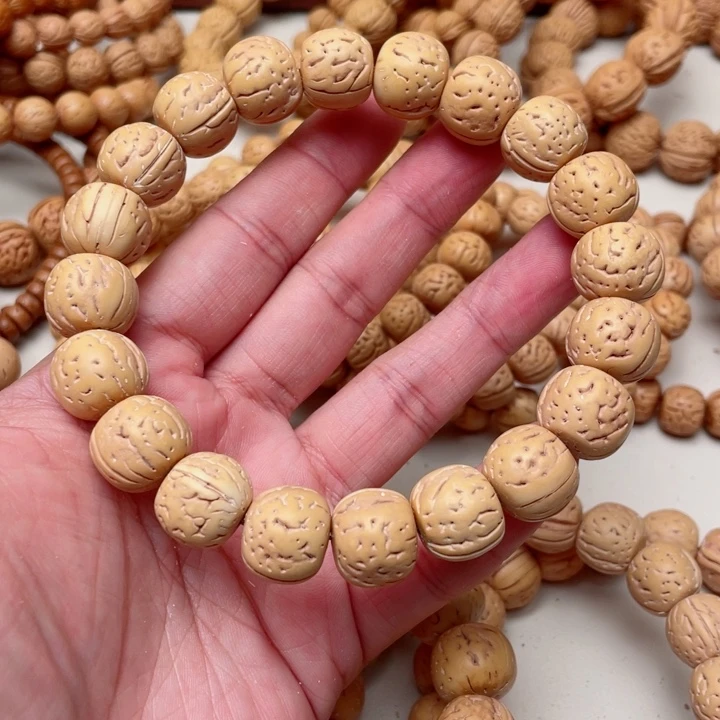 脂***烧手串桃核奶油核留纹