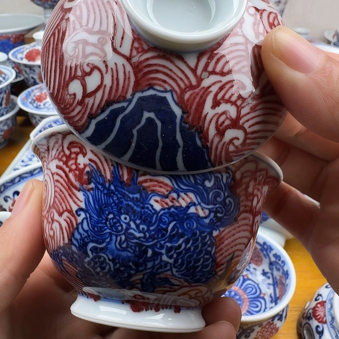 微瑕釉里红麒麟踏浪元宝盖碗