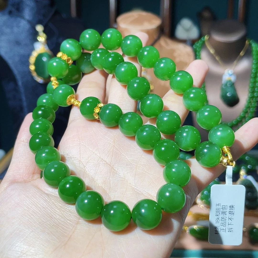 刘***商颈饰18K金镶嵌和田玉（碧玉）
