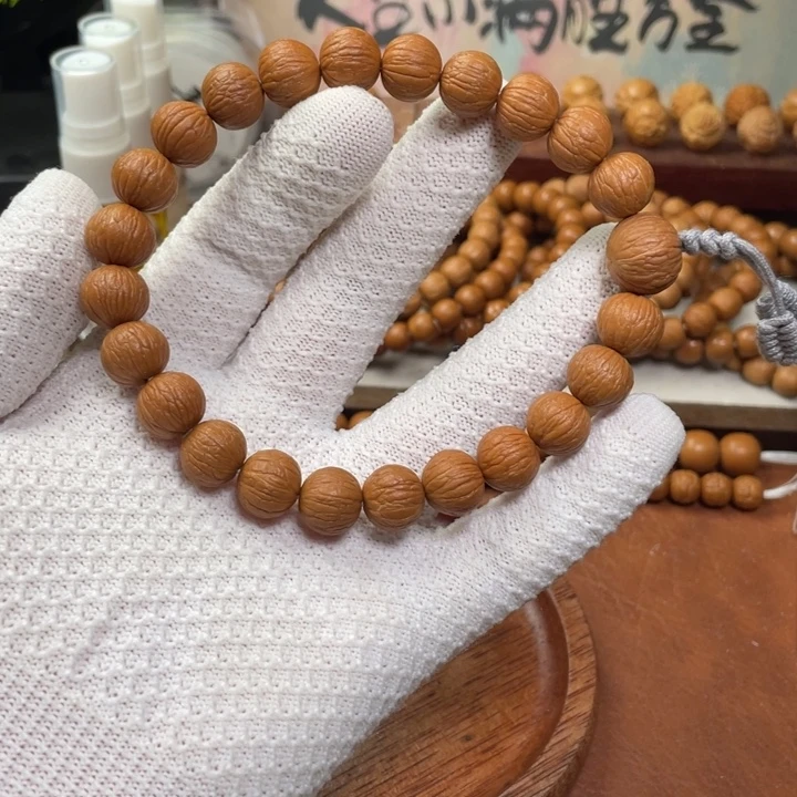 唐***材手串猴头核桃凤羽