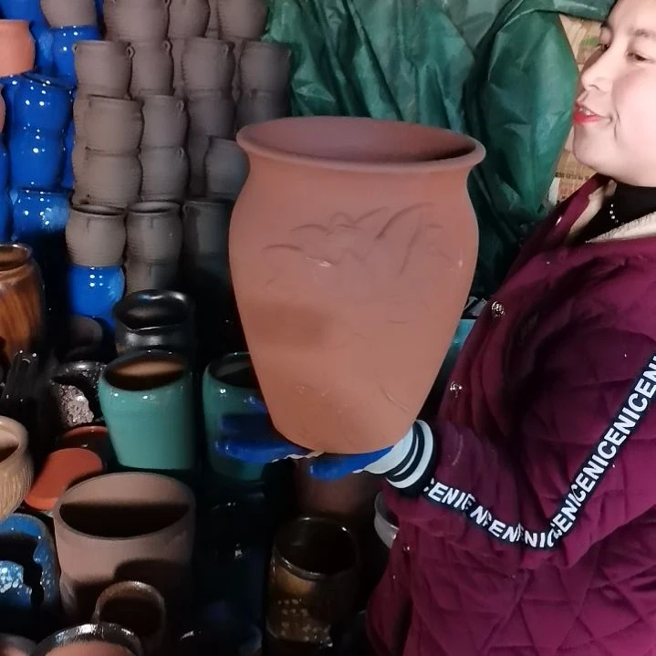 红陶口20高27瑕疵底裂