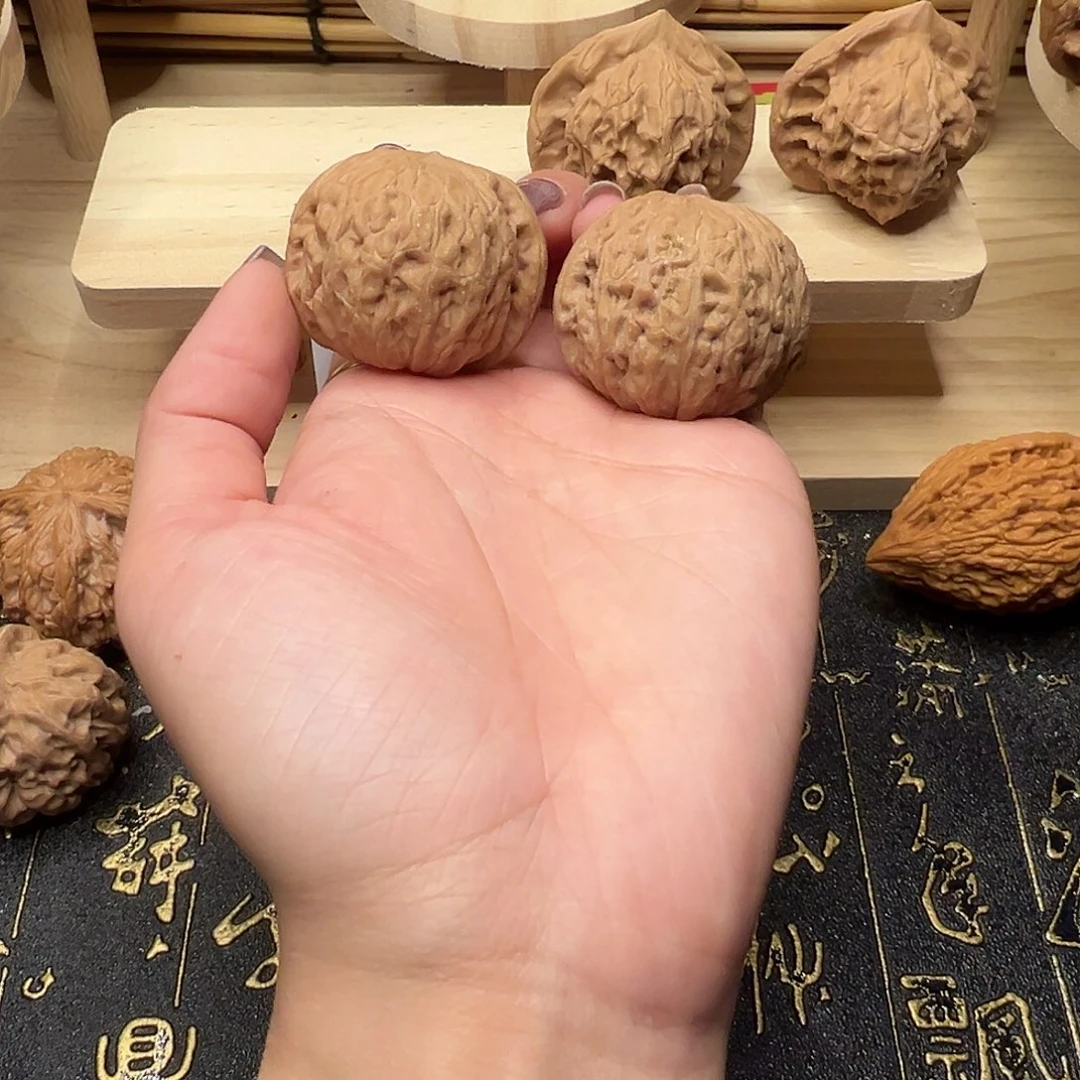 把件桃核铁锤37手把件