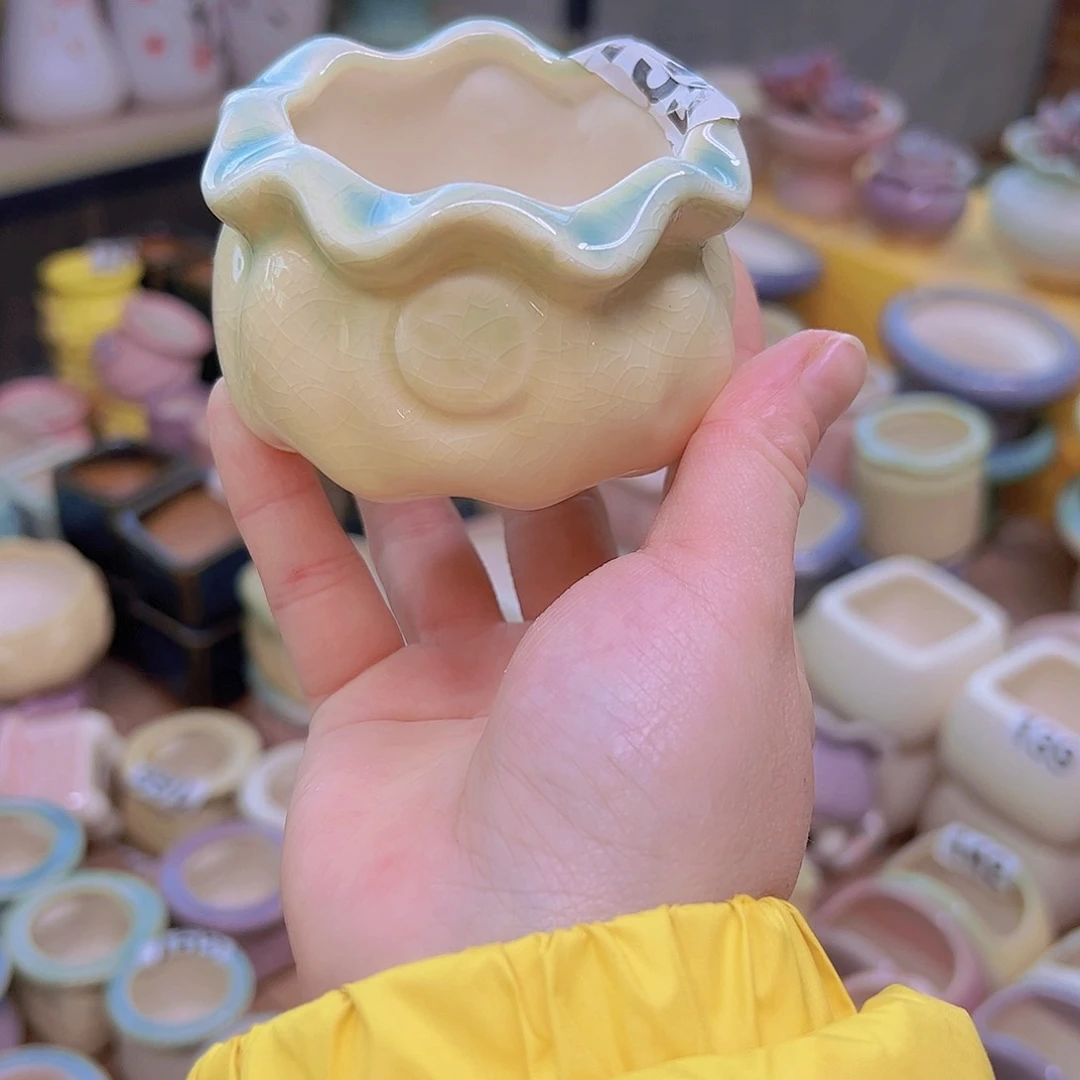 红陶花****店陶瓷花盆当场12包邮50个送5个