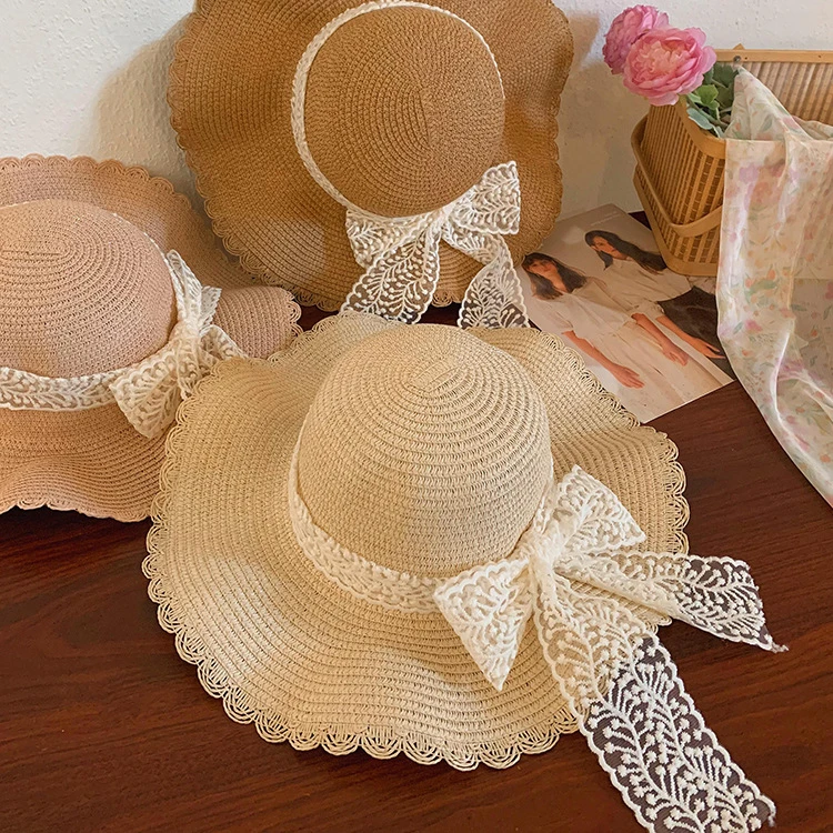 2025新款大帽檐草帽遮阳帽海边防晒帽蕾丝蝴蝶结手工草编