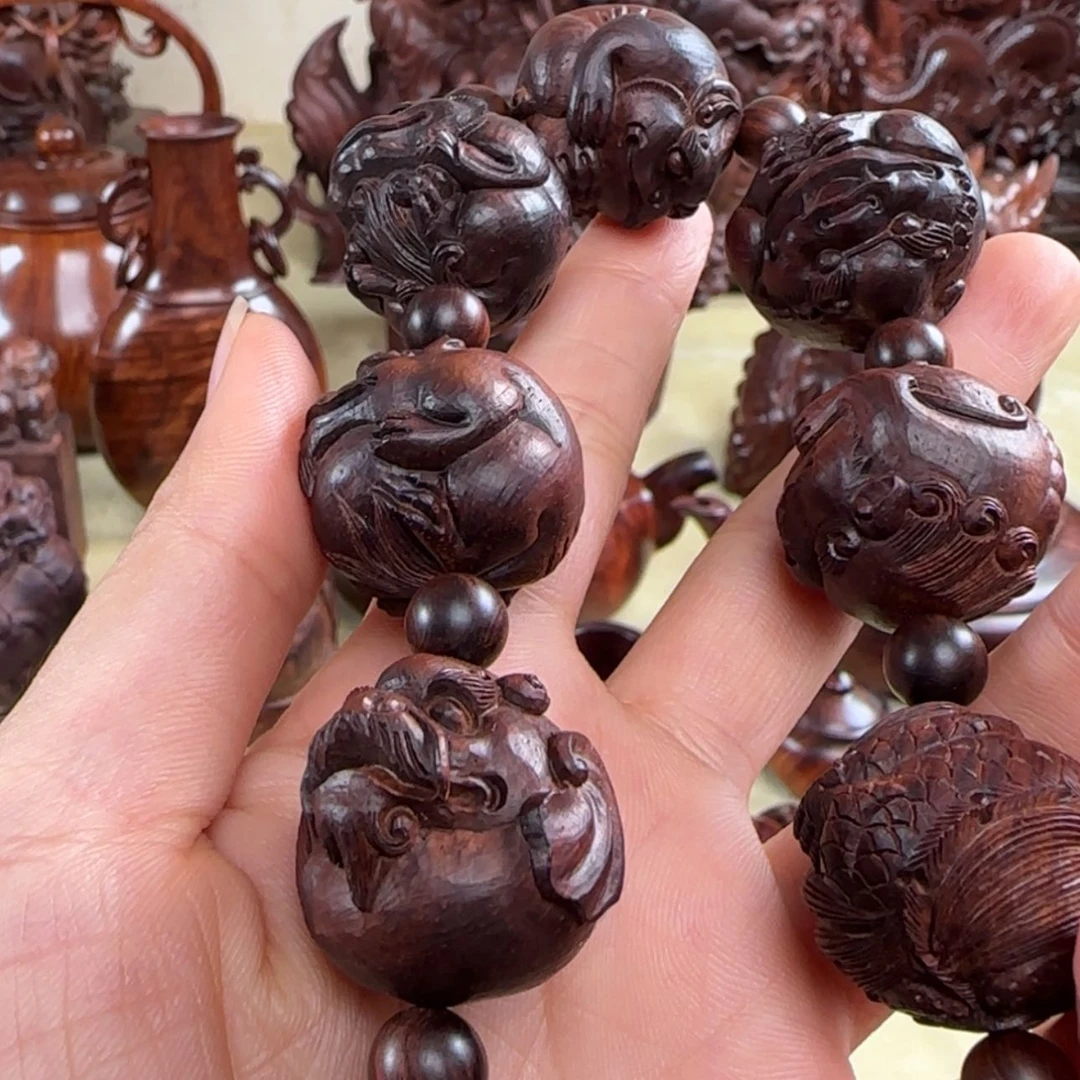 【闪购商品】黄花梨/降香黄檀陈**?龙生九子 雕刻珠