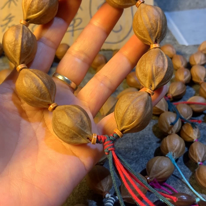 葛***杠橄榄核手串/手链广东梅林铁核22*28