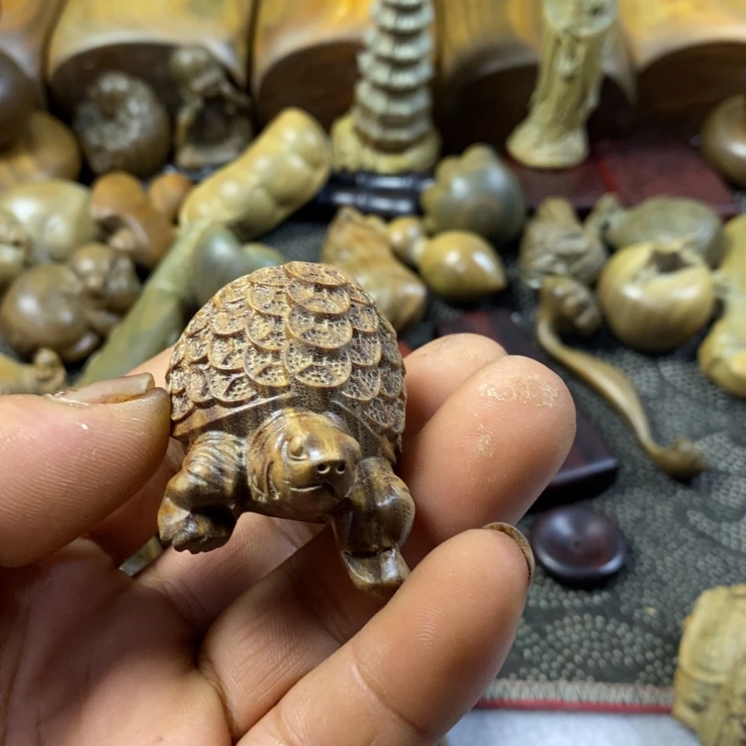 李***。陶瓷绿檀木制工艺品23