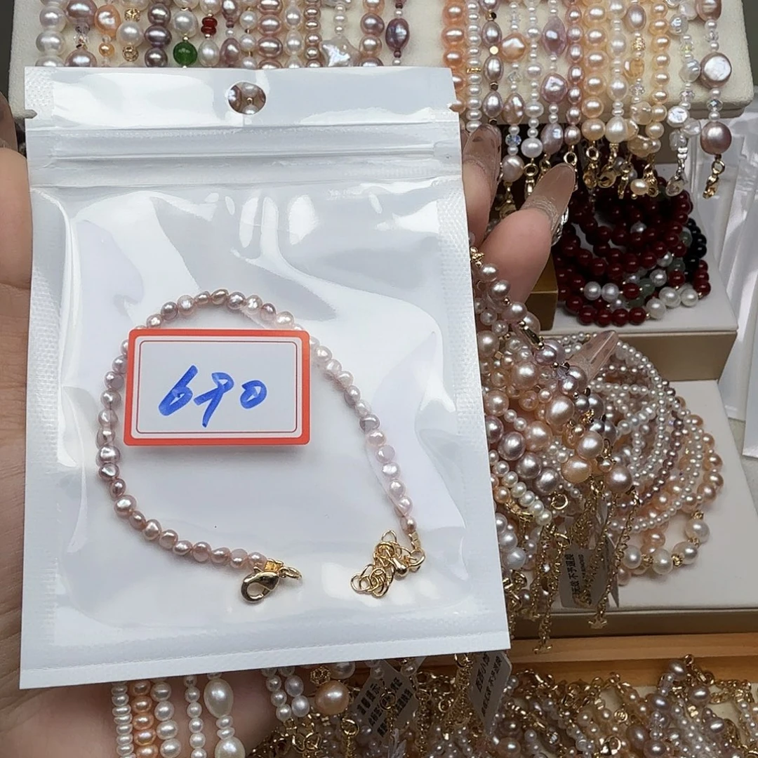 至***…钛钢手绳淡水珍珠