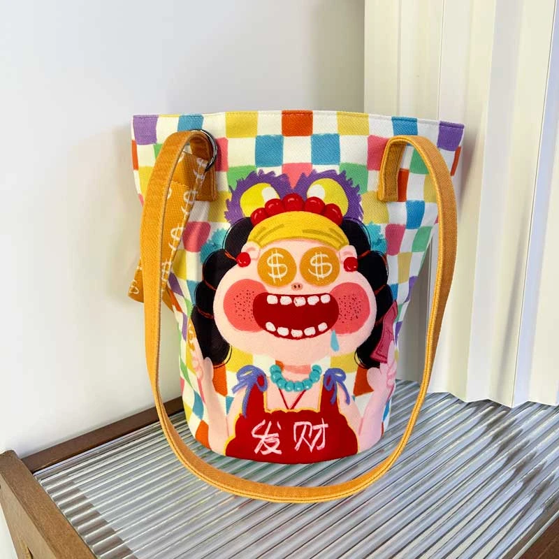 秋冬新款发财女孩单肩包大水桶包大容量洋气休闲布包卡通文艺风