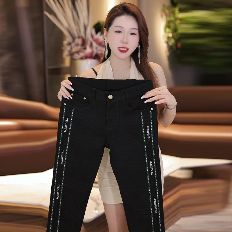 夏季新款男士烫钻牛仔裤黑色提花时尚潮流百搭修身弹力裤子男显高