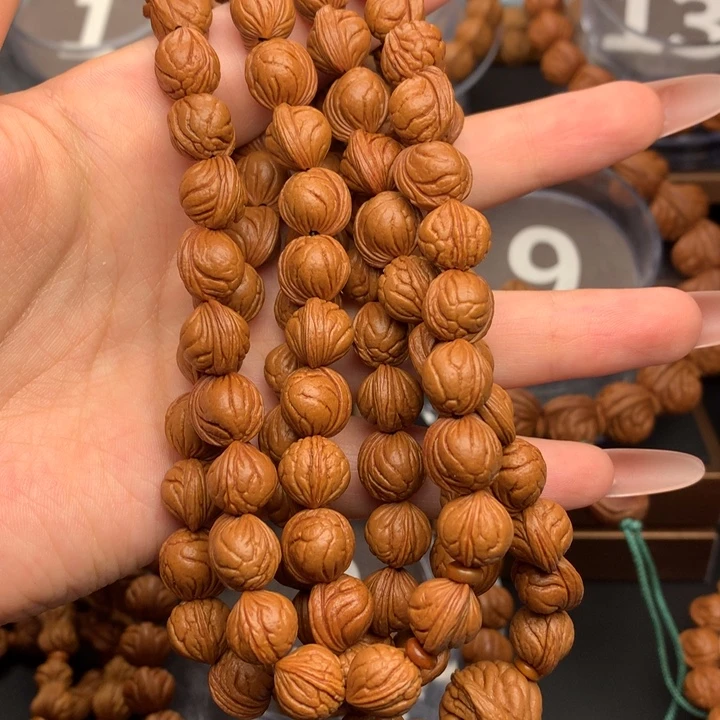 淘***卉桃核吊坠野生玉龙脊10脖挂无修