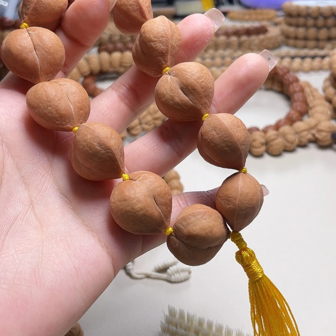 有***性文玩核桃手串屁桃