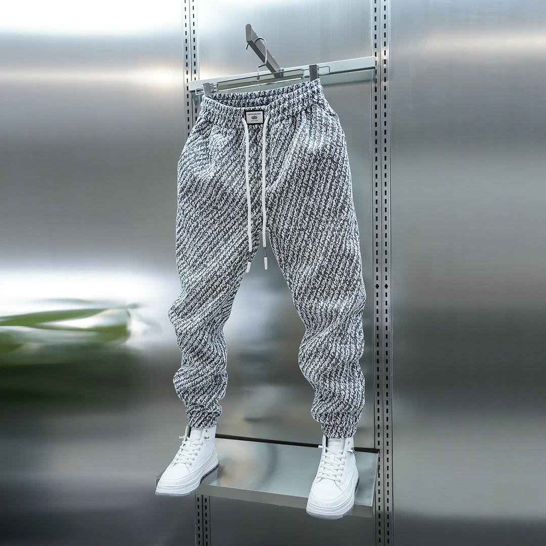 男士冬季新款加绒休闲裤弹力松紧腰宽松束脚哈伦裤时尚韩版小脚裤