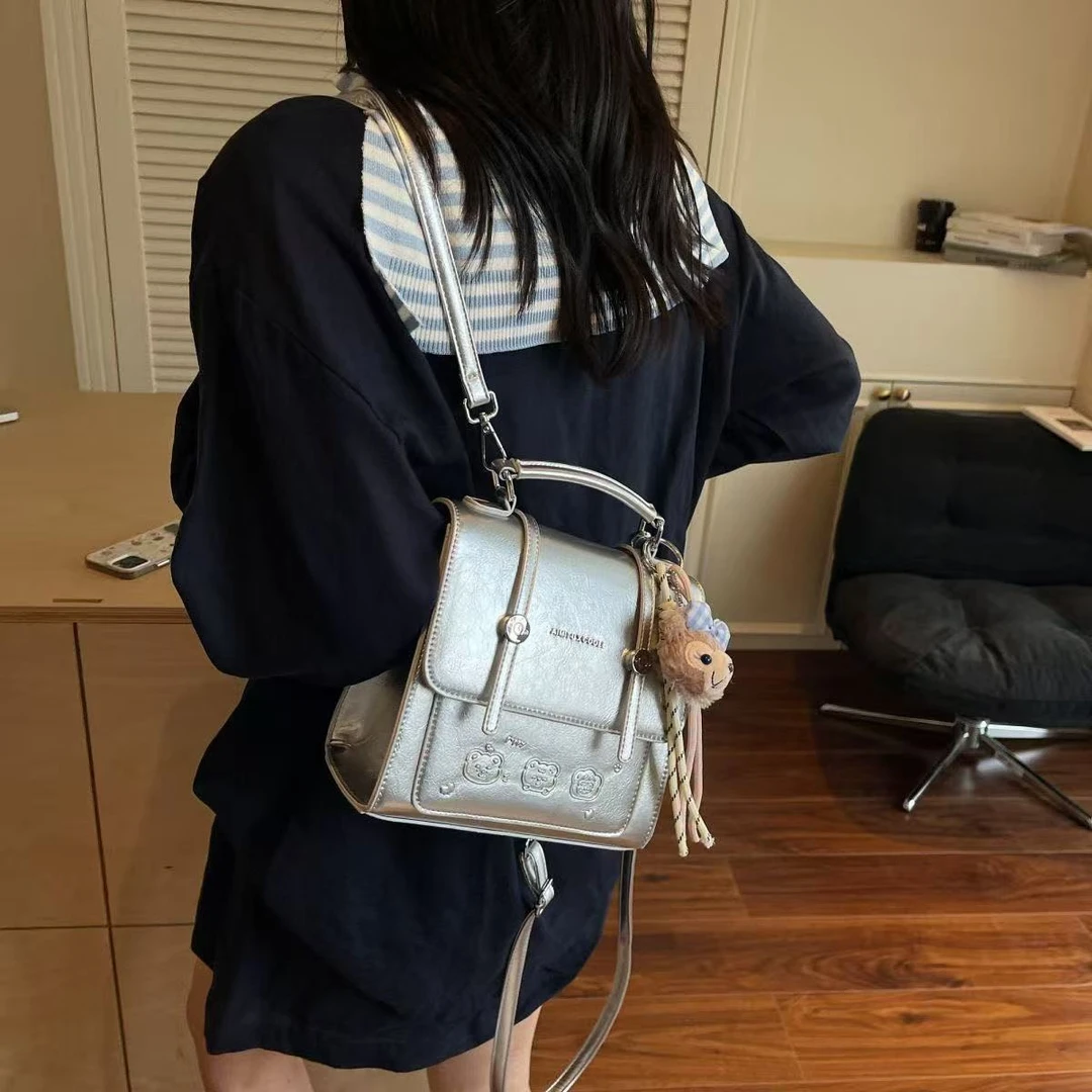 【粉丝专享】女包2025新款时尚纯色设计简约潮流洋气小众双肩包x