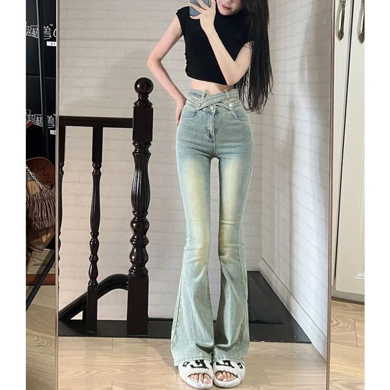 美式辣妹交叉镂空微喇叭牛仔裤子女春季新款设计感复古高腰拖地裤