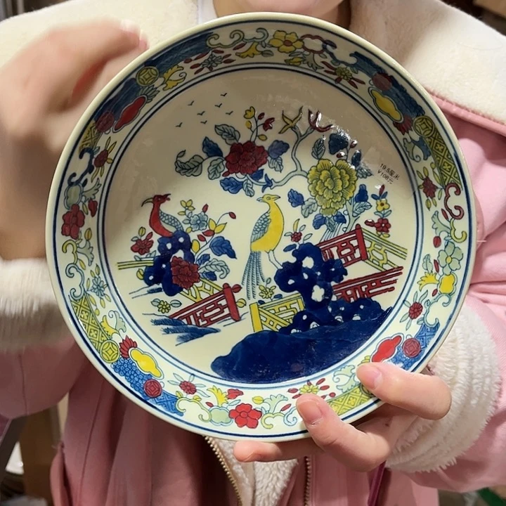 瓷片////////直径19厘米。黄。