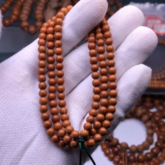 手串橄榄核核尖加长5.2圆珠
