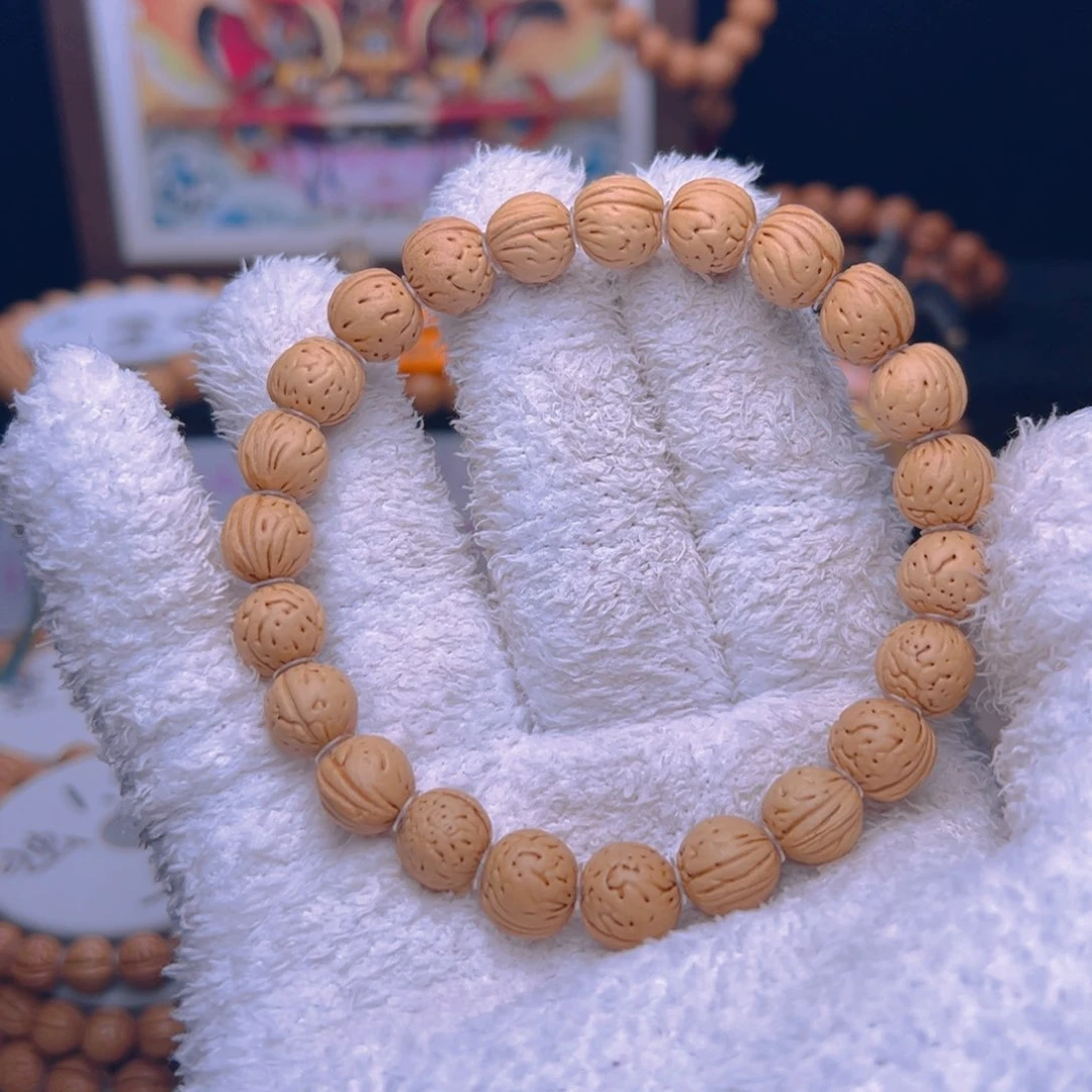 桃核手串T****，1.0加小奶豆单圈
