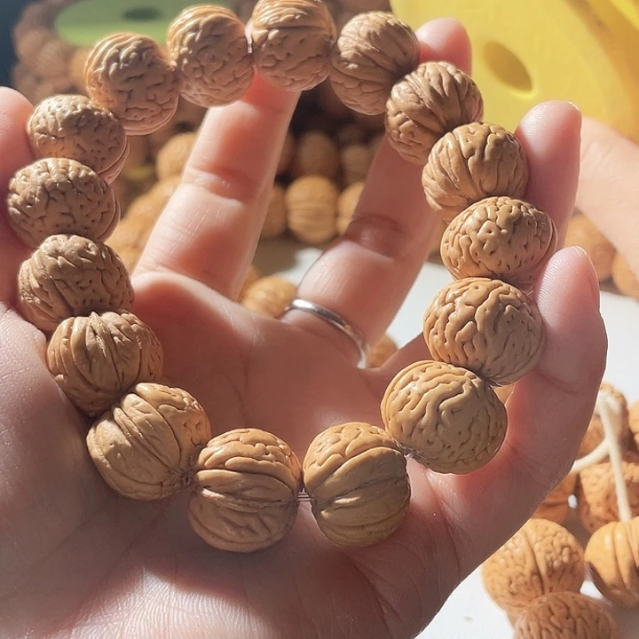 甘***德桃核吊坠桃核手串芭蕉66