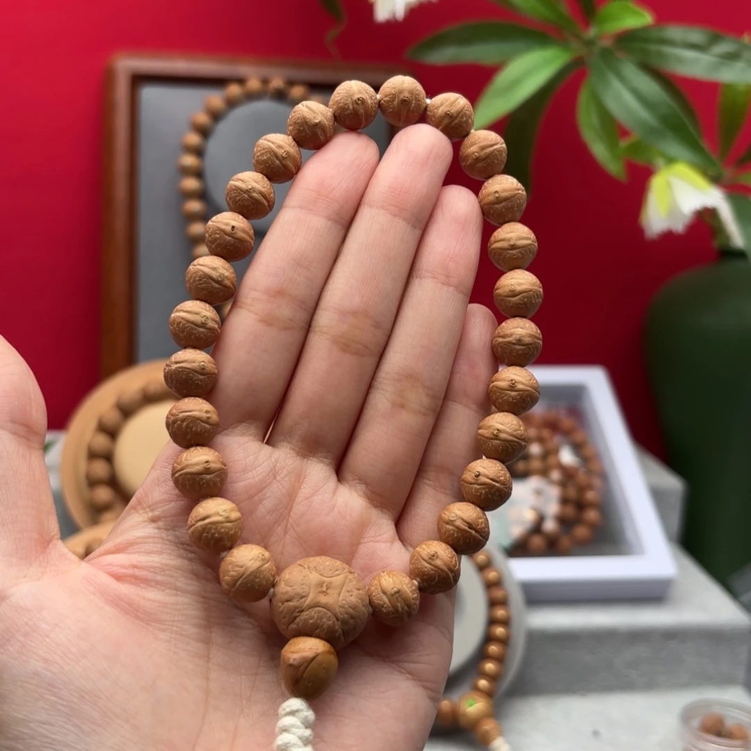 凤眼菩提手串11左右实心籽手持27颗籽