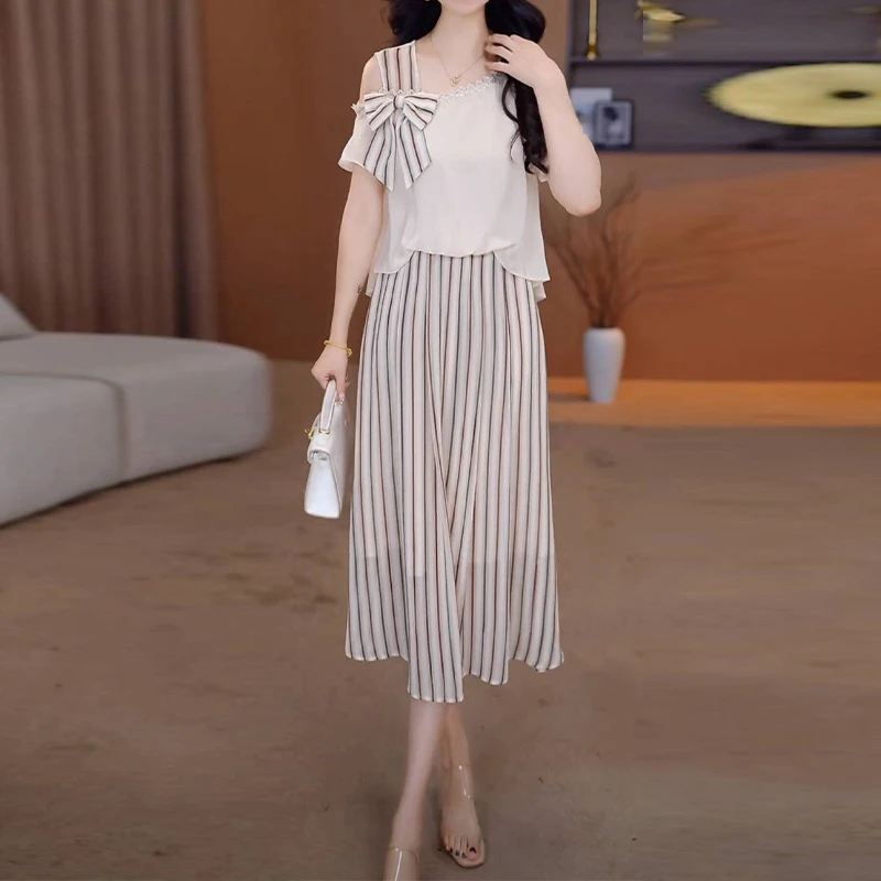 时尚条纹连衣裙女夏季2025新款轻奢高级感露肩显瘦遮肚假两件裙子